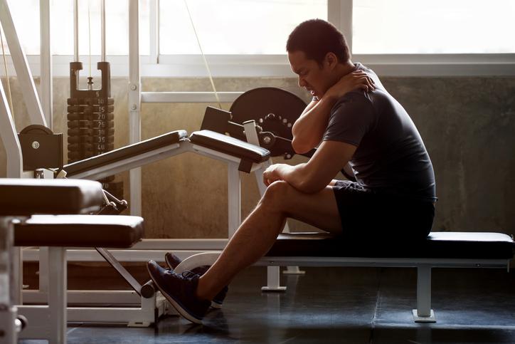Male having shoulder pain from rotator cuff injury Male having shoulder pain from rotator cuff injury